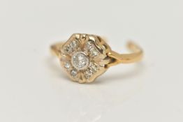 A DIAMOND CLUSTER RING, AF, designed as a two tier cluster, the central brilliant cut diamond within