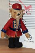 A BOXED LIMITED EDITION STEIFF NUTCRACKER MUSICAL TEDDY BEAR, with mohair and cotton cinnamon 'fur',