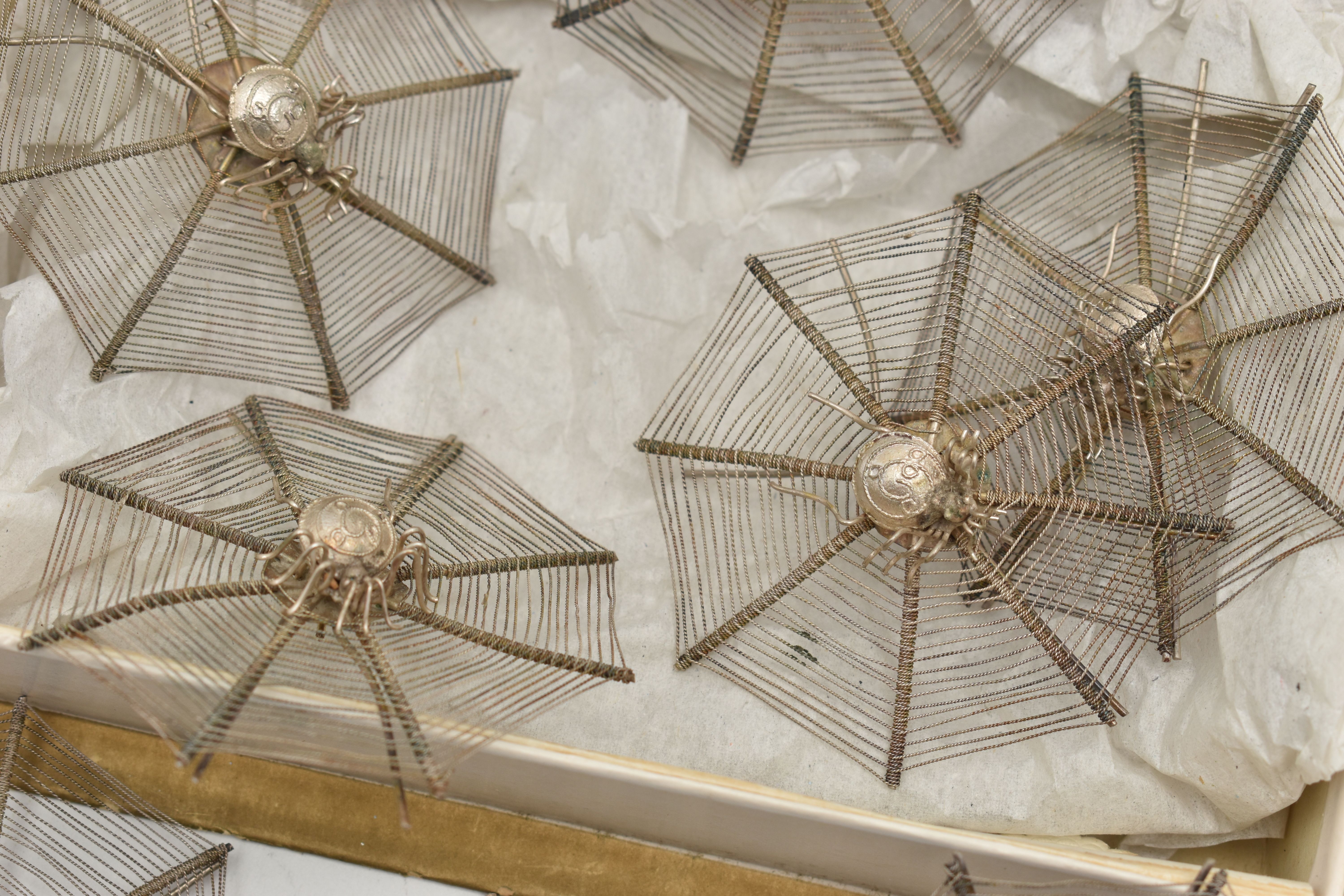 A SET OF TWELVE NOVELTY WHITE METAL OCTAGONAL FILIGREE EASEL BACK PLACE NAME HOLDERS IN THE FORM - Image 2 of 5