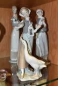A GROUP OF THREE LLADRO FIGURINES, comprising 4591 'Girl With a Cockerill', 4595 'Girl with Lamb'