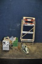 A TRAY CONTAINING TOOLS AND A SMALL FOLDING WORK BENCH including a Knight Taylor KT150 petrol