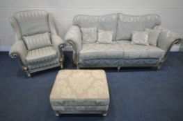 AN ITALIAN STYLE THREE PIECE LOUNGE SUITE, comprising a two seater sofa, with gold and foliate