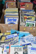 FIVE BOXES OF FOOTBALL PROGRAMMES containing several hundred matchday programmes from the 1960's -