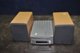 A DENON RCD.M35DAB CD RECEIVER and a pair of SC.M73 speakers (PAT pass and working)