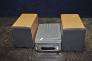 A DENON RCD.M35DAB CD RECEIVER and a pair of SC.M73 speakers (PAT pass and working)