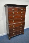 A GEORGIAN MAHOGANY CHEST ON CHEST, with loose cornice, fitted with an arrangement of eight drawers,