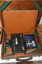 A WOODEN BOX OF ASSORTED TOOLS, to include a part set of Goliath 'O-Vee' Screw thread measuring