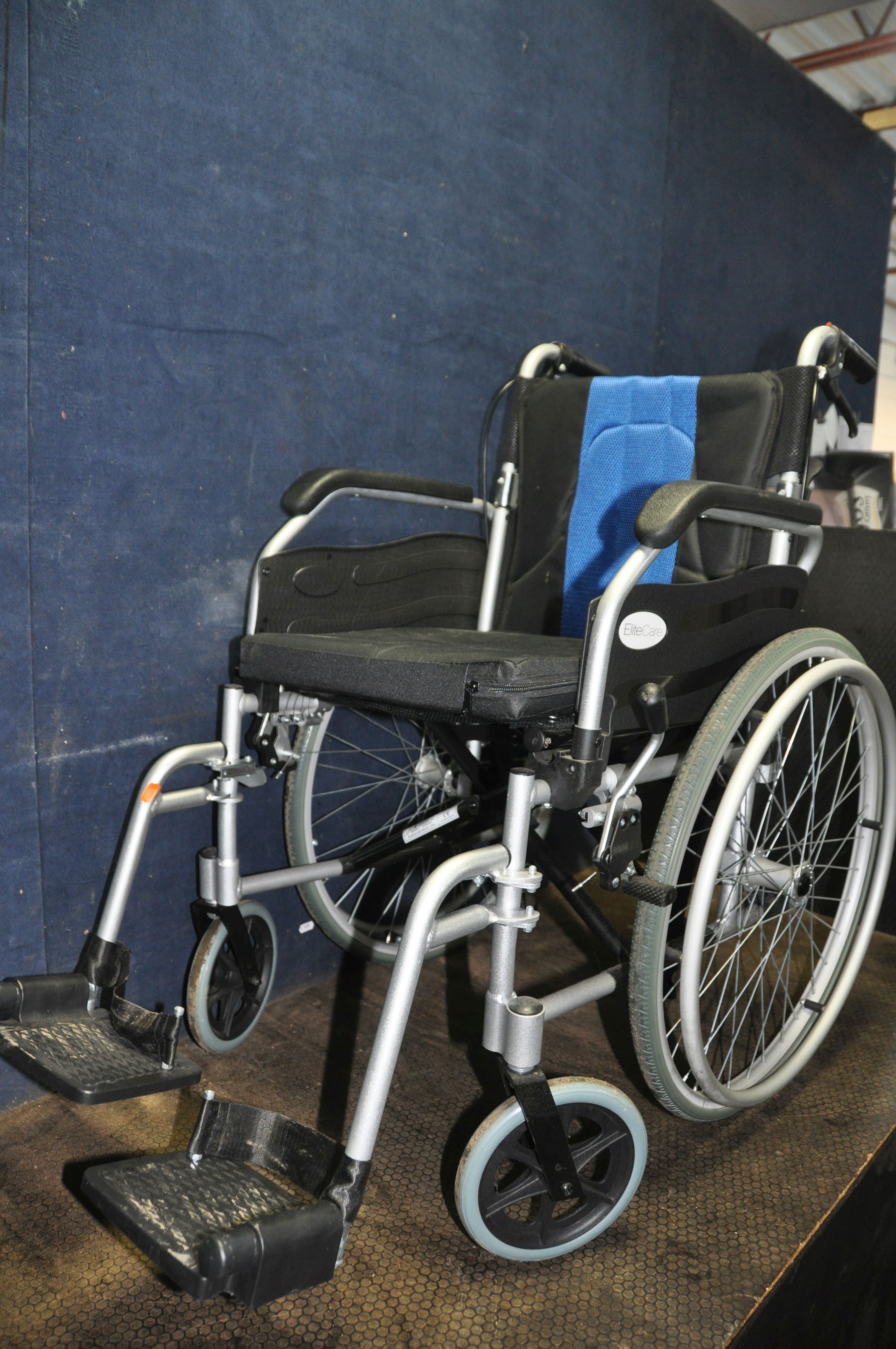 AN ELITE CARE FOLDING WHEELCHAIR with two footrests and padded seat cushion - Image 2 of 3