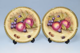 TWO AYNSLEY ORCHARD GOLD CABINET PLATES, with raised gilt rims, each bearing printed D Jones