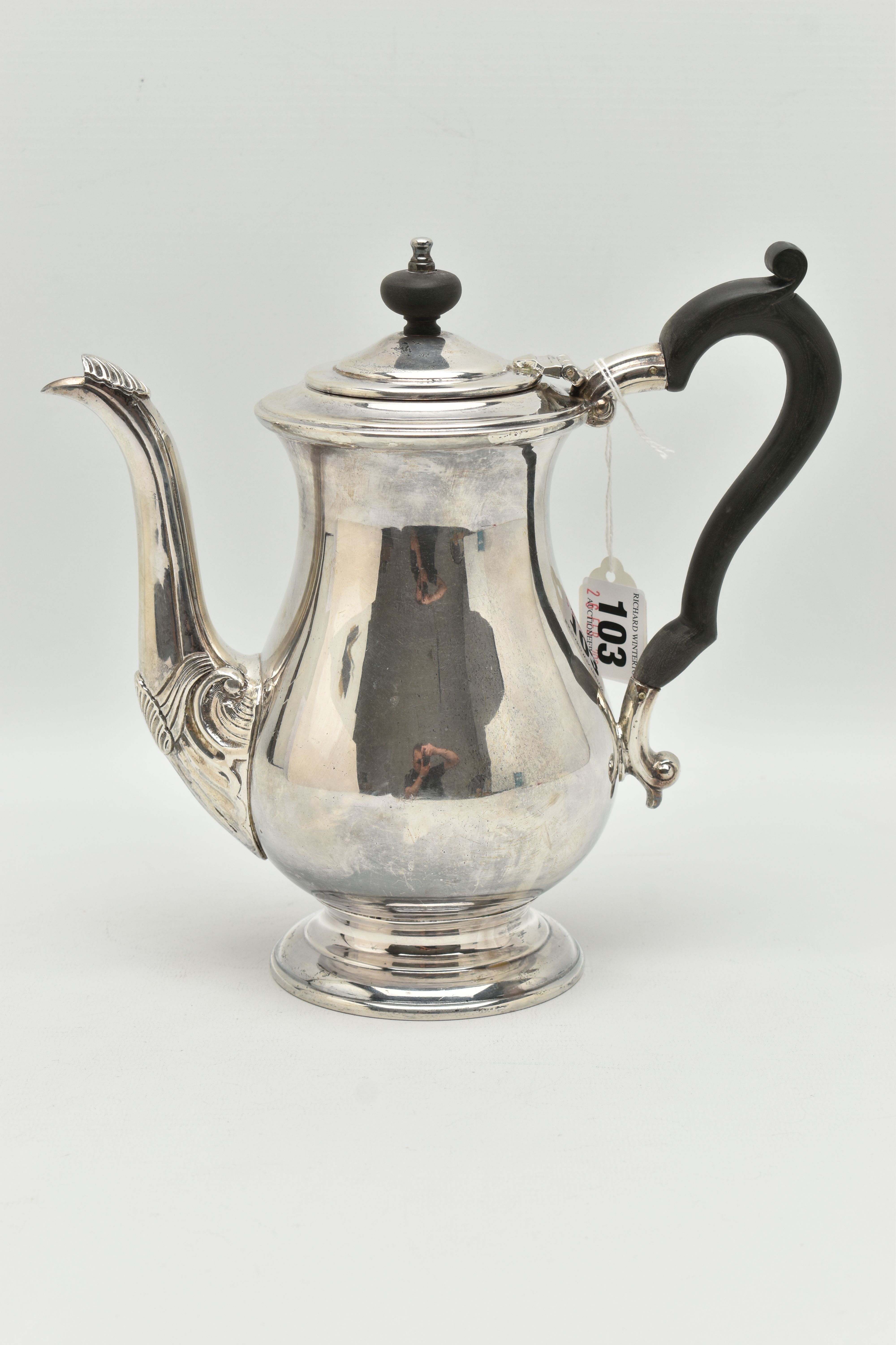 AN ELIZABETH II SILVER TEAPOT, polished bell shape, shell pattern to the base of the spout, hinged