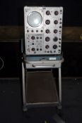 A VINTAGE TEKTRONIX TYPE 545B OSCILLOSCOPE ON STAND (UNTESTED as no plug fitted)