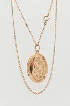 A 9CT GOLD LOCKET, an oval form locket with embossed thistle detail, hallmarked 9ct Birmingham,