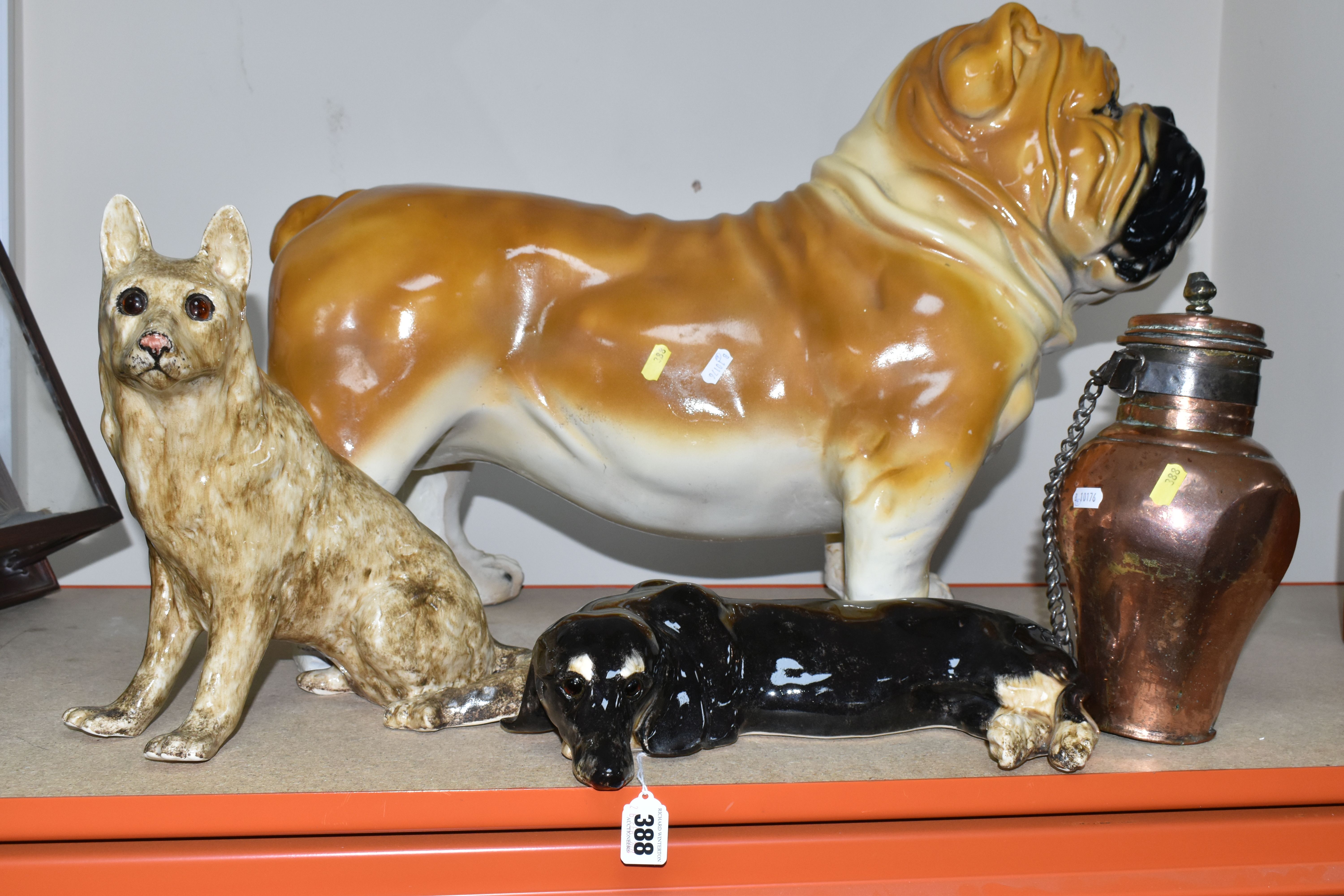 A GROUP OF CERAMIC DOGS, comprising two Winstanley dogs comprising an Alsatian and Dachshund, a