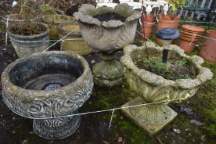 THREE SIMILAR WEATHERED ACANTHUS LEAF SHAPED CIRCULAR PLANTERS, largest planter diameter 50cm x