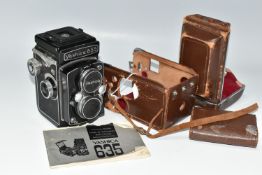 A YASHICA 635 TWIN LENS CAMERA AND CASE, the camera has the 35mm film adaptor kit fitted, together