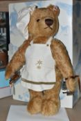 A BOXED STEIFF LIMITED EDITION 'CHRISTMAS BAKER' TEDDY BEAR, NO.021244, no.374 / 1000, reddish blond