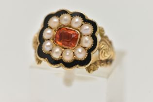 A GEORGIAN ENAMEL AND PEARL MOURNING RING, centering on a cushion cut orange stone assessed as