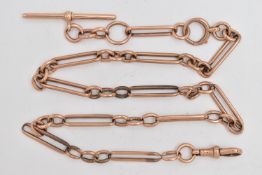 AN EARLY 20TH CENTURY 9CT ROSE GOLD FETTER LINK ALBERT CHAIN, fitted with a lobster clasp and a bolt