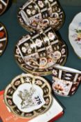 A GROUP OF ROYAL CROWN DERBY IMARI 2451 TEA CUPS, SAUCERS AND A TRINKET DISH, comprising a boxed