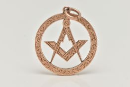 A ROSE METAL MASONIC PENDANT, of a circular open work form, depicting square and compass, with