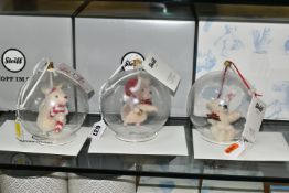 THREE BOXED LIMITED EDITION STEIFF CHRISTMAS ORNAMENTS, each in a glass sphere, to include Teddy