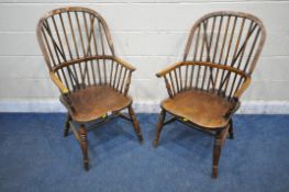 A NEAR PAIR OF 19TH CENTURY ELM FARMHOUSE STYLE WINDSOR ARMCHAIRS, with spindle back, turned