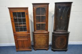 A WALNUT CORNER CUPBOARD, with a glazed door, that's enclosing two shelves, above a cupboard door,