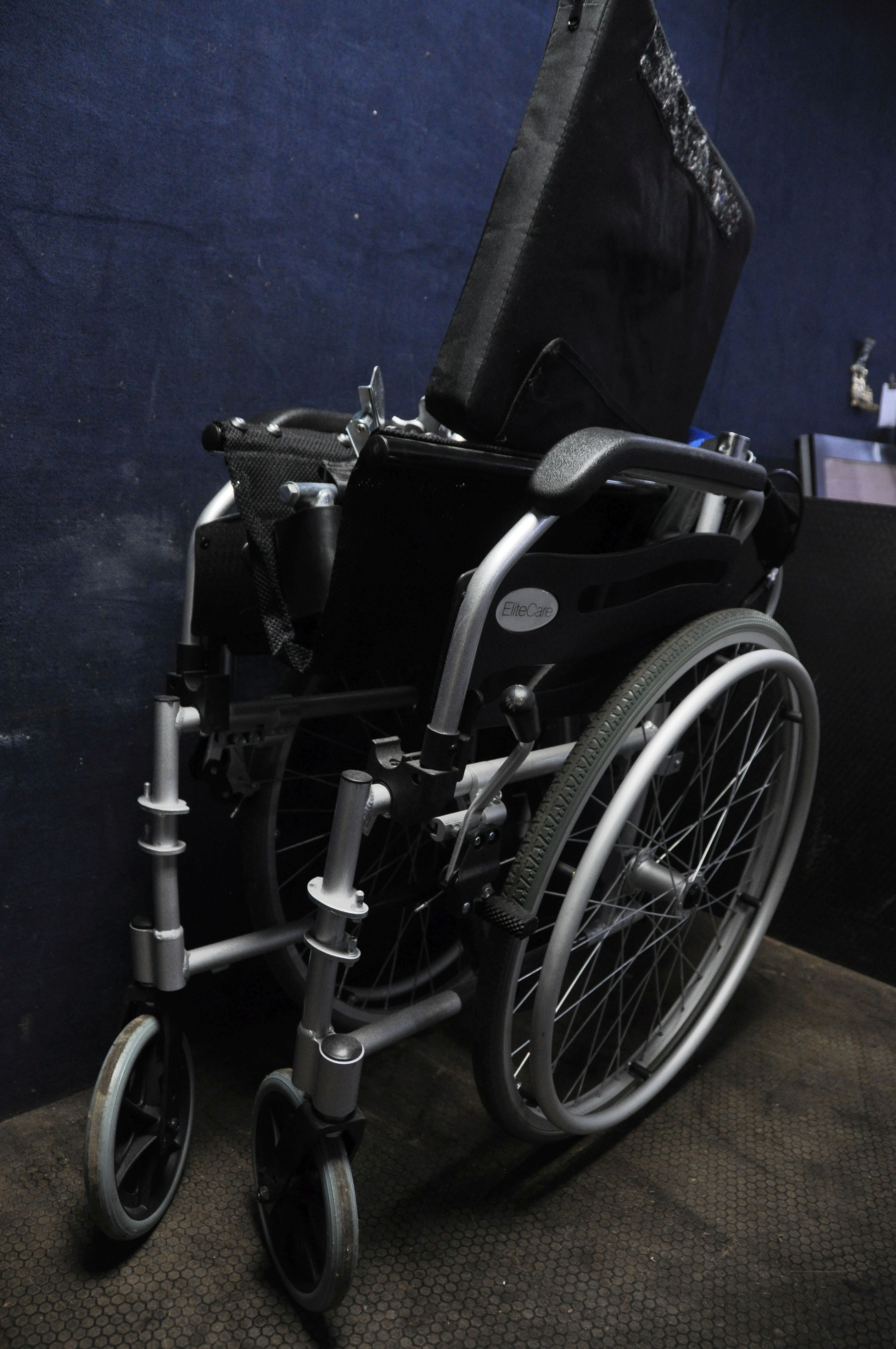 AN ELITE CARE FOLDING WHEELCHAIR with two footrests and padded seat cushion - Image 3 of 3