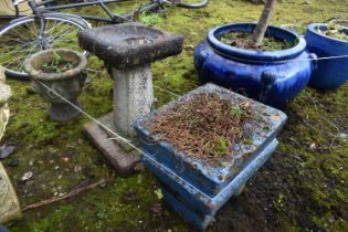 A WEATHERED COMPOSITE BIRD BATH, height 46cm, along with a pair of small garden urns, diameter