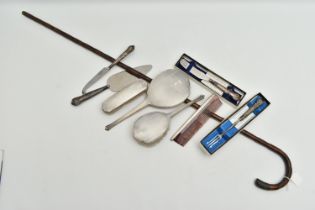 A SILVER FOUR PIECE VANITY SET, SILVER HANDLED CUTLERY AND A WALKING STICK, set comprising of a hair