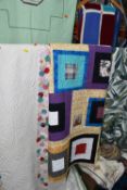 TWO BOXES AND LOOSE APPLIQUÉ AND QUILTED BED COVERS, comprising a hand sewn large green and cream
