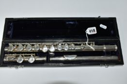 A CASED FLUTE, by Trevor J. James, stamped T.J. 10 with serial no 11709, in a hard fitted case (