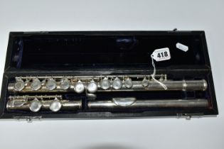 A CASED FLUTE, by Trevor J. James, stamped T.J. 10 with serial no 11709, in a hard fitted case (