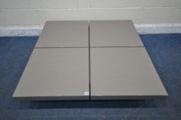 A DWELL BASSO LOW COFFEE TABLE, with extending storage mechanism, 111cm squared x height 26cm (
