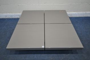 A DWELL BASSO LOW COFFEE TABLE, with extending storage mechanism, 111cm squared x height 26cm (