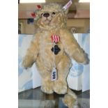 A BOXED STEIFF LIMITED EDITION COWARDLY LION TEDDY BEAR, no. 682674, from the Wizard of Oz 2014