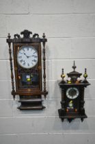 A 19TH CENTURY ROSEWOOD AND MARQUETRY INLAID WALL CLOCK, with turned spindles, flanking a glazed