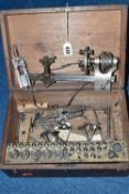 A CASED WATCHMAKER'S LATHE, in need of some attention, parts unchecked (1) (Condition Report: af,