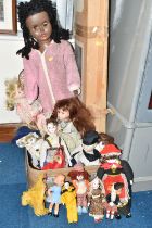 A GROUP OF VINTAGE DOLLS, to include a vintage suitcase containing eight collectable porcelain
