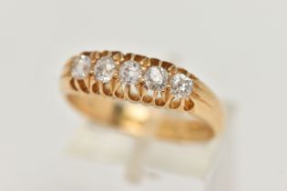 A LATE VICTORIAN 18CT GOLD FIVE STONE DIAMOND RING, designed as a line of old cut diamonds,