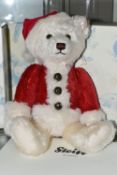 A BOXED LIMITED EDITION STEIFF CHRISTMAS MUSICAL TEDDY BEAR, with red and white mohair and cotton,