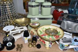 A QUANTITY OF KITCHENWARE, comprising a set of pale green Swan cannisters and bread bin, three