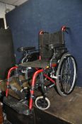 A KARMA MOBILITY WHEELCHAIR with two footrests