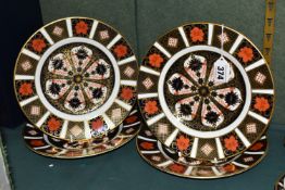 FOUR ROYAL CROWN DERBY IMARI 1128 TEA PLATES, diameter 21.5cm, backstamps vary (4) (Condition