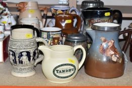 A SELECTION OF DECORATIVE JUGS AND TANKARDS ETC, to include a Taylor Tunnicliffe jug with silver