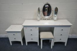 A WHITE DRESSING TABLE, fitted with two banks of three drawers, length 137cm x depth 44cm x height
