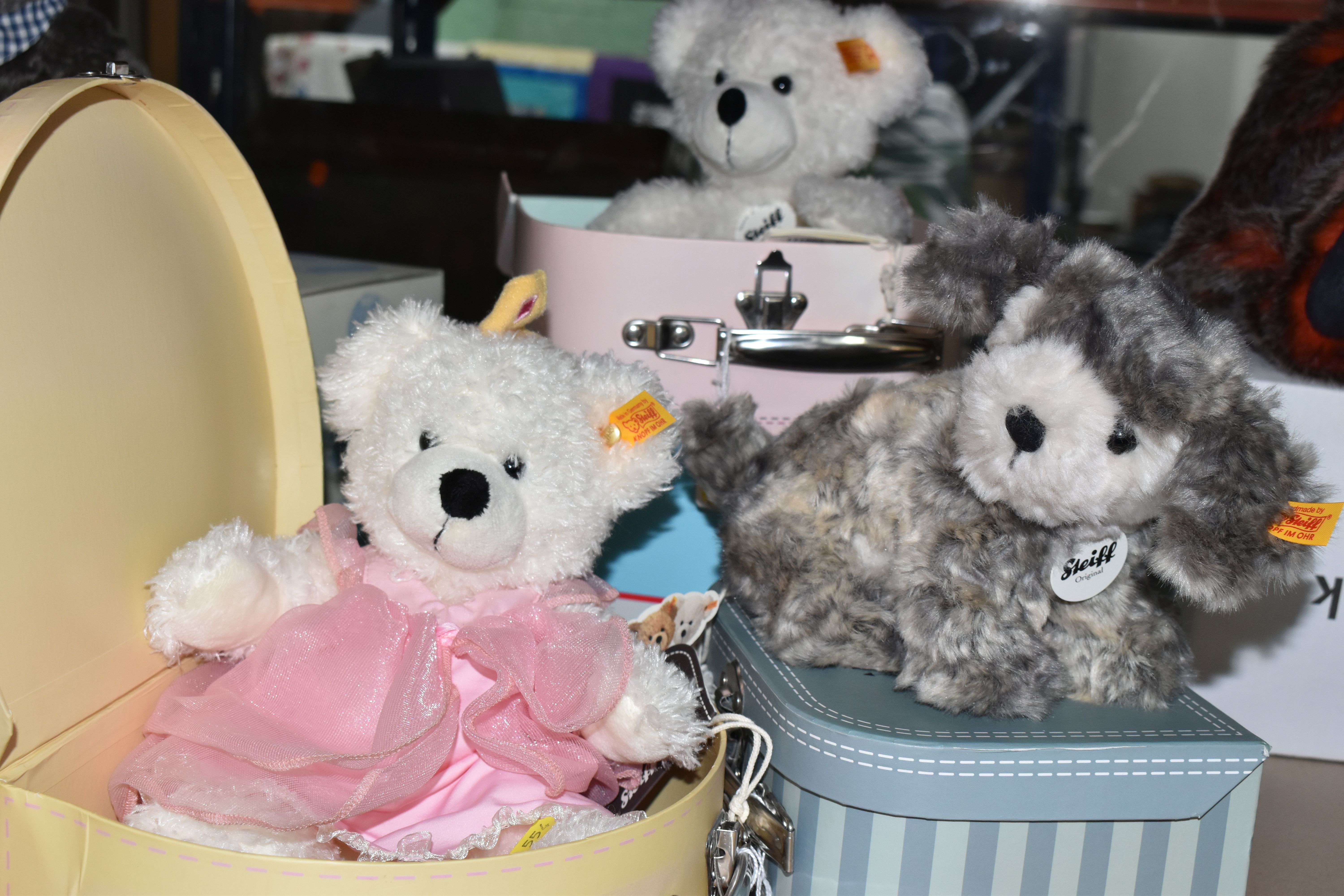 THREE STEIFF BEARS/ SOFT TOYS IN SUITCASES AND ONE CARD BOX, comprising Lotte Teddy Bear Princess (