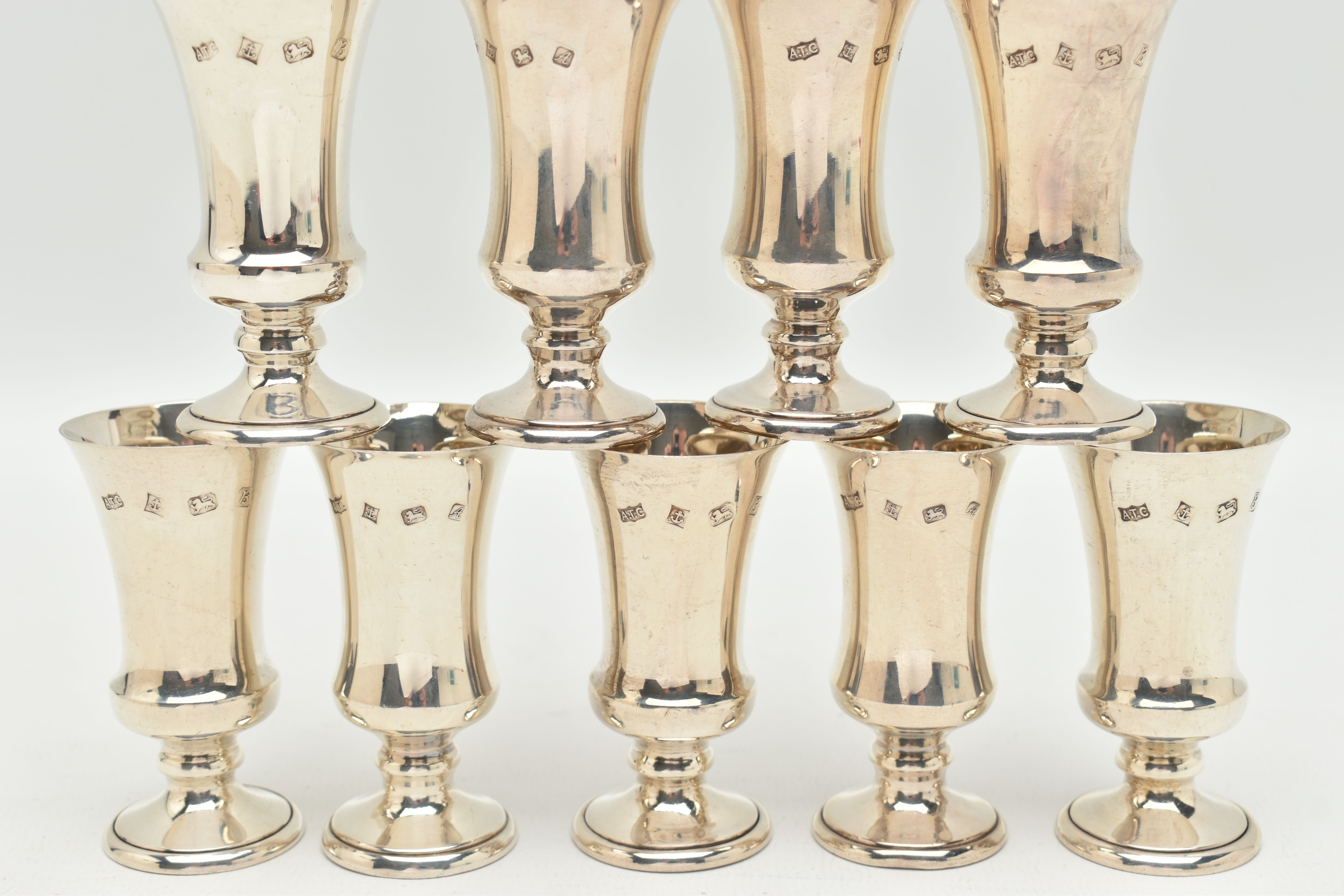 A SET OF TWELVE SILVER LIQUOR/SHERRY CUPS, tapering on round based, gilt interiors, hallmarked 'A - Image 3 of 3