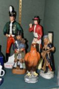 A GROUP OF ADVERTISING FIGURES AND DECANTERS, comprising a 'Thomas Radford 'Sunday's Fantasy' mild