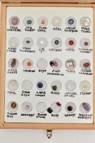 A BOXED GEMSTONE SPECIMEN SET, the thirty piece set includes sapphire, fire opal, pink tourmaline,